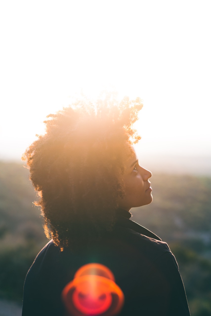 Backlit profile portrait at sunset